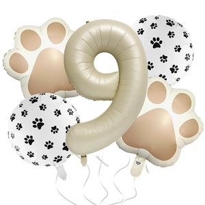 Detailed set of cream number 9 balloon and paw print balloons for pet birthday parties