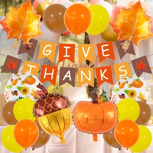 Thanksgiving party kit with Give Thanks banner, maple leaf, pumpkin and acorn foil balloons