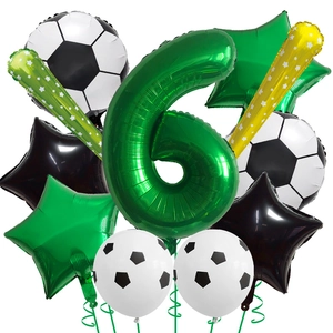 Macro detail of football theme birthday balloon set featuring green number 6 and star shapes