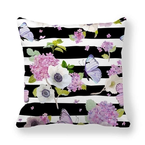 Detail of floral peach skin pillowcase with black stripes and purple hydrangea print