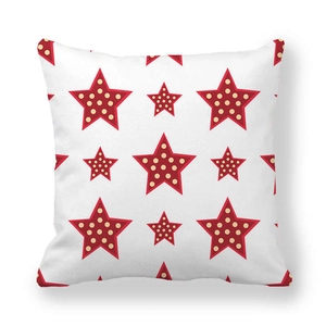 Macro shot of thick peach skin fabric texture with red stars and yellow polka dots