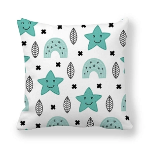 Detail of soft peach skin cushion cover with mint star and rainbow patterns in Nordic style