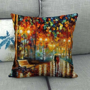 Detailed view of square linen pillow cover featuring impressionist park oil painting