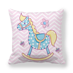Close-up of peach skin fabric pillowcase with cute cartoon rocking horse illustration