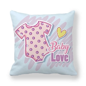 Close-up of peach skin fabric pillowcase with Baby Love print and cute baby jumpsuit
