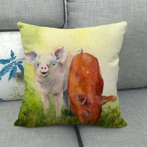 Macro shot of rustic linen cushion cover with hand-painted watercolor pig pattern