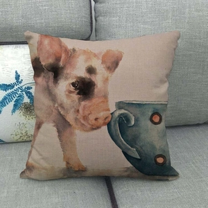 Close-up of vintage watercolor pig and blue cup print on linen texture throw pillow