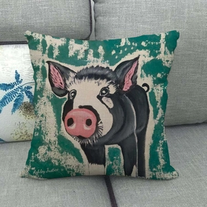 Artistic pig painting pillow detail with Ashley Justice signature on linen texture fabric
