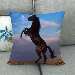 Detailed texture of linen cushion cover with digital print of running horse on sofa