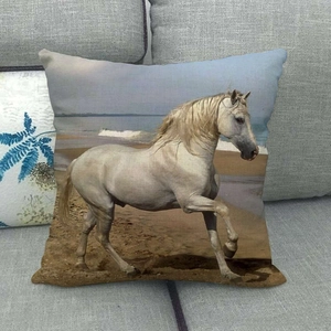 Detailed view of white horse print texture on a linen fabric decorative pillowcase