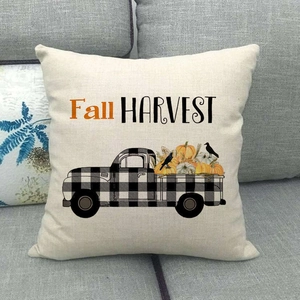 Fall Harvest throw pillow featuring black white plaid truck and pumpkins on linen cover