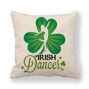 Detail of Irish Dancer linen pillowcase showing green shamrock and dancing silhouette