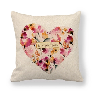 Detail view of linen cushion cover featuring watercolor floral heart and love you Mum text