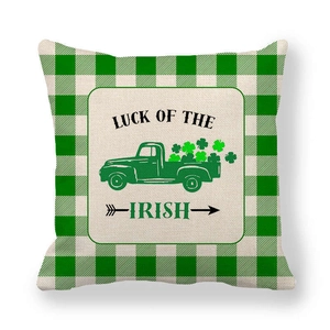 Detail of linen texture on St. Patrick's Day clover truck and green plaid pillowcase