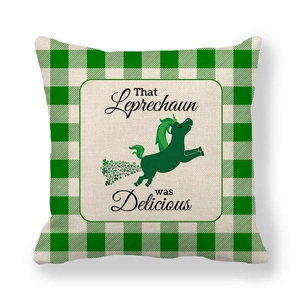 Detail of green gingham linen pillow cover with unicorn and St. Patrick's Day quote