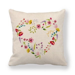 Close-up of linen blend pillowcase with watercolor floral heart pattern on beige fabric
