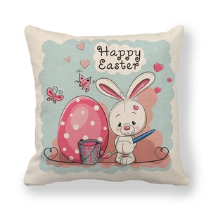 Close-up of linen Easter pillow cover with bunny and colorful egg pattern