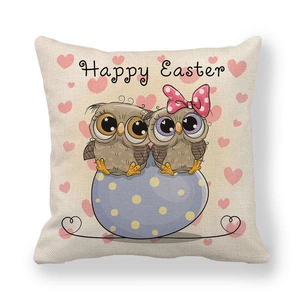 Detailed texture of linen Easter pillowcase with cartoon owls and Happy Easter print