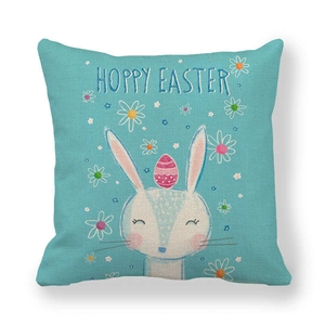 Detail of Hoppy Easter blue linen pillowcase featuring a cartoon bunny and egg design