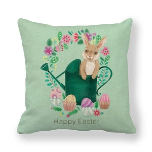 Happy Easter linen pillow case featuring bunny in a watering can with floral decor