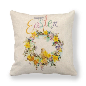 Detail eines Oster-Kissenbezugs aus Leinen mit Happy Easter Schriftzug und Küken-Motiv