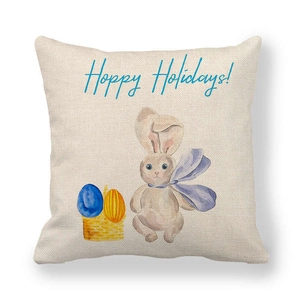 Dettaglio macro della federa in lino con coniglietto pasquale e testo Hoppy Holidays