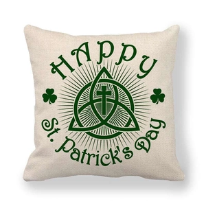 Detailed texture of St. Patrick's Day linen pillowcase with green clover and celtic knot