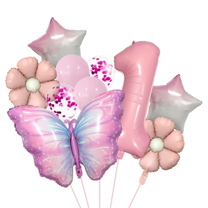 Detail of pink butterfly balloon set with a 32-inch number 1 for a 1st birthday party