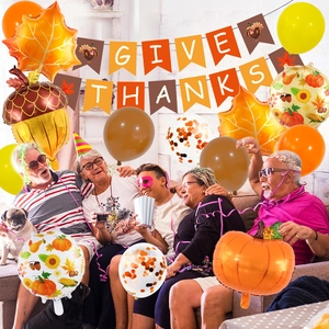 Thanksgiving party decoration kit with maple leaf balloons and Give Thanks banner set