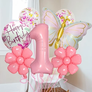 Détail du ballon numéro 1 rose de 32 pouces avec décor de fête papillon et confettis