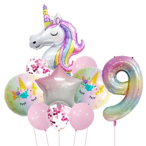Close-up of unicorn party balloon set with gradient number 9 and star foil details