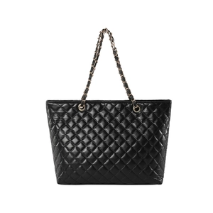 Classic black quilted tote bag with spacious interior and gold-tone chain handles