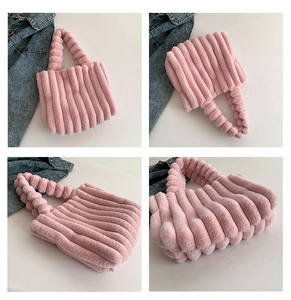 Detail of pink faux fur tote bag with vertical pleated texture and soft plush handles