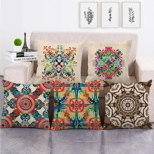 Set of 5 colorful mandala geometric pattern linen pillow covers on a beige sofa
