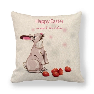 Close-up of linen Easter pillow cover featuring a cute rabbit and Happy Easter text
