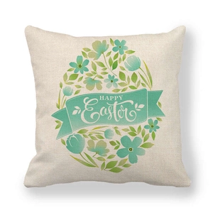Close-up of linen Easter pillowcase featuring floral egg design and Happy Easter text