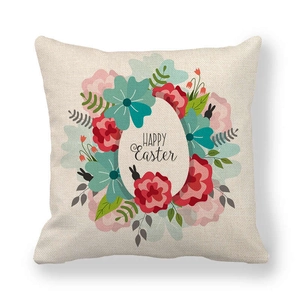 Detail of linen Easter pillowcase featuring floral wreath and Happy Easter text