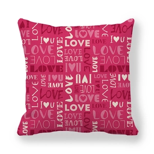 Detailed view of magenta linen pillowcase featuring artistic Love and I Heart U prints