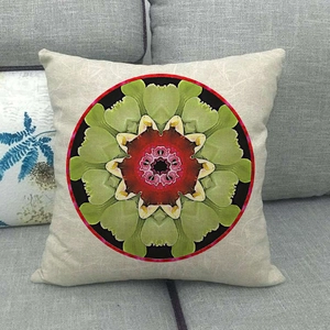 Detailed close-up of bohemian kaleidoscope pattern on linen texture throw pillowcase