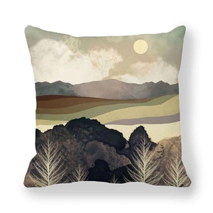 Detail of square peach skin pillowcase with abstract mountain sun and landscape print