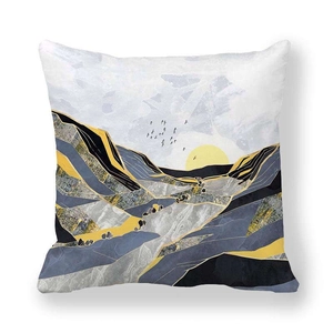 Detail of soft peach skin pillow cover with abstract marble mountain and sun landscape print