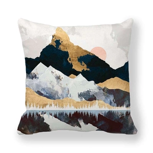 Close-up of abstract mountain landscape print on soft peach skin fabric cushion cover