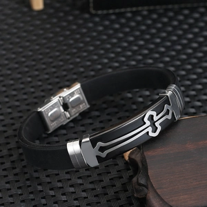 Close-up of a men's silicone cross bracelet with a durable stainless steel folding clasp