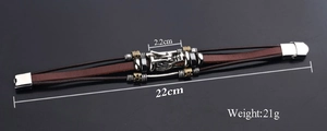 Detail of multi-layer leather bracelet with dragon head charm and 22cm length mark