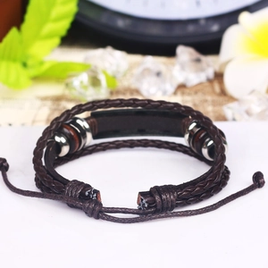 Retro brown braided leather skull bracelet with metallic beads and adjustable drawstring