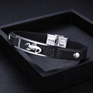 Men's leather bracelet with silver stainless steel scorpion plate on black jewelry box
