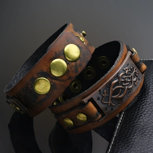 Punk vintage brown leather bracelet set with geometric metal studs and embossed charms