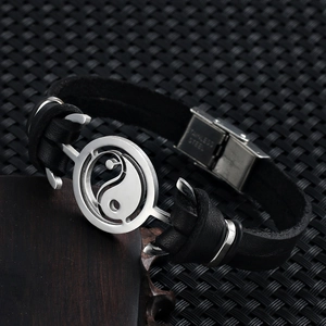 Vintage black braided leather bracelet with silver yin yang stainless steel charm