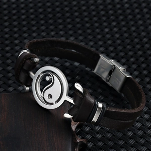 Men's vintage brown leather bracelet featuring stainless steel Yin Yang Tai Chi symbol