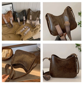 Détail du sac à bandoulière rétro en cuir mat avec large sangle jacquard et style épuré